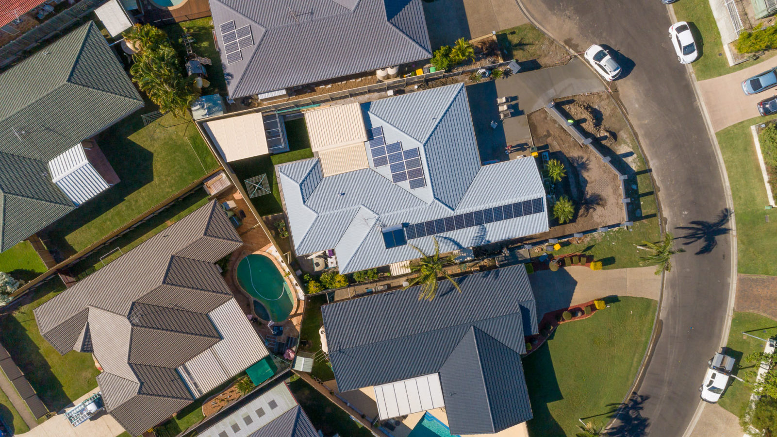 Aerial nadir drone view of a house and surrounding property